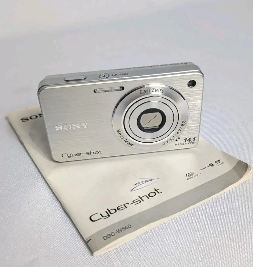 Sony Cyber Shot DSC-W560 14.1MP Digital Still Camera Silver Manual No Charger